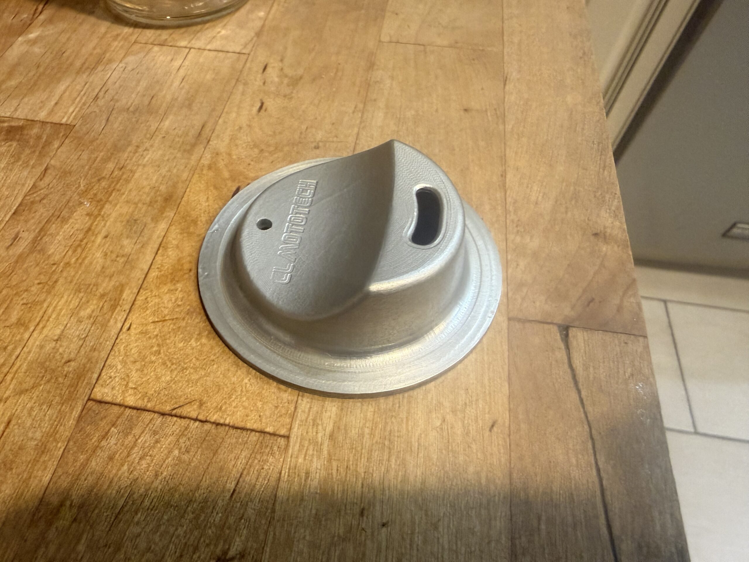 Silver anodized JarMagic aluminum lid with machined CL MotoTech lettering