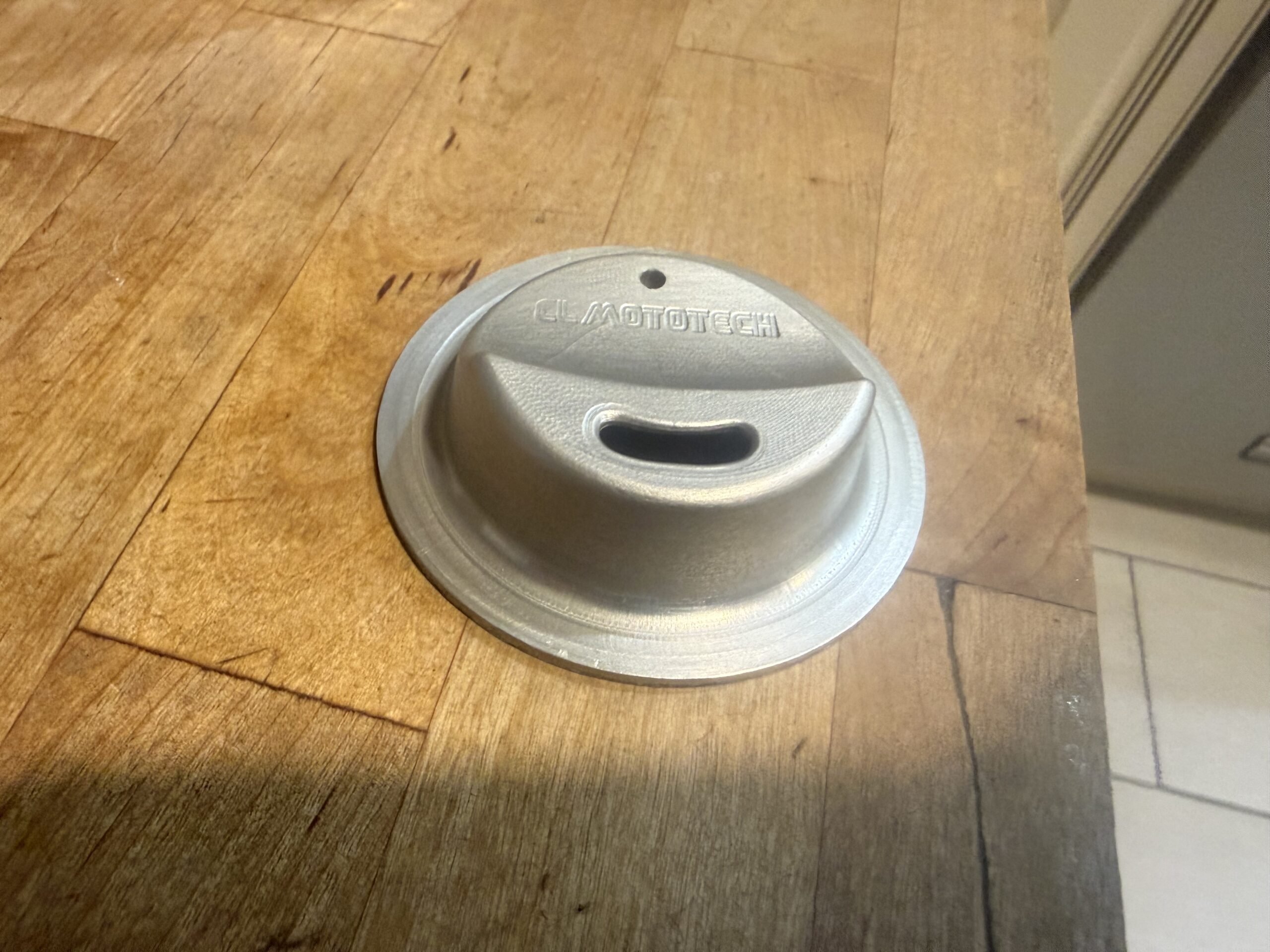 Silver anodized JarMagic aluminum lid with machined CL MotoTech lettering